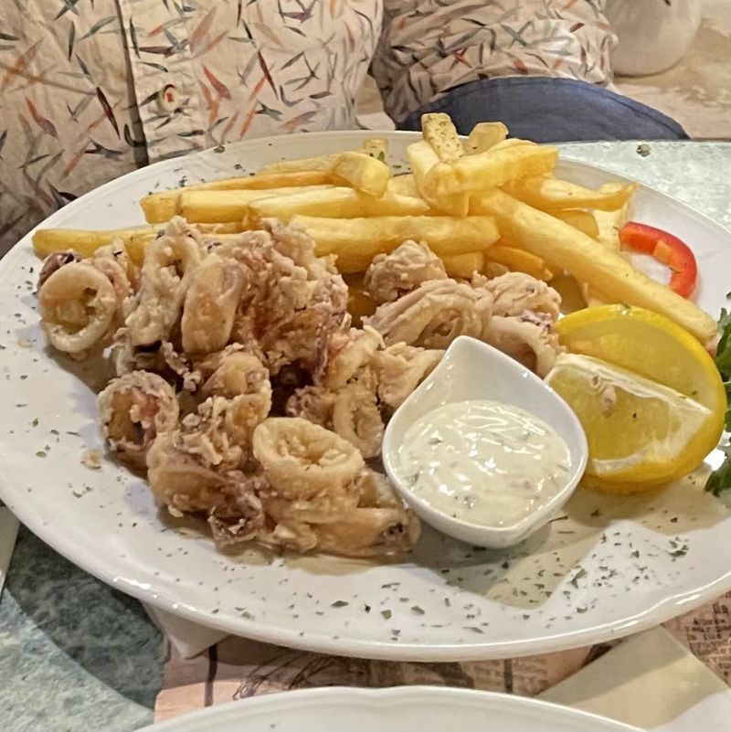 Fried calamari with fries
