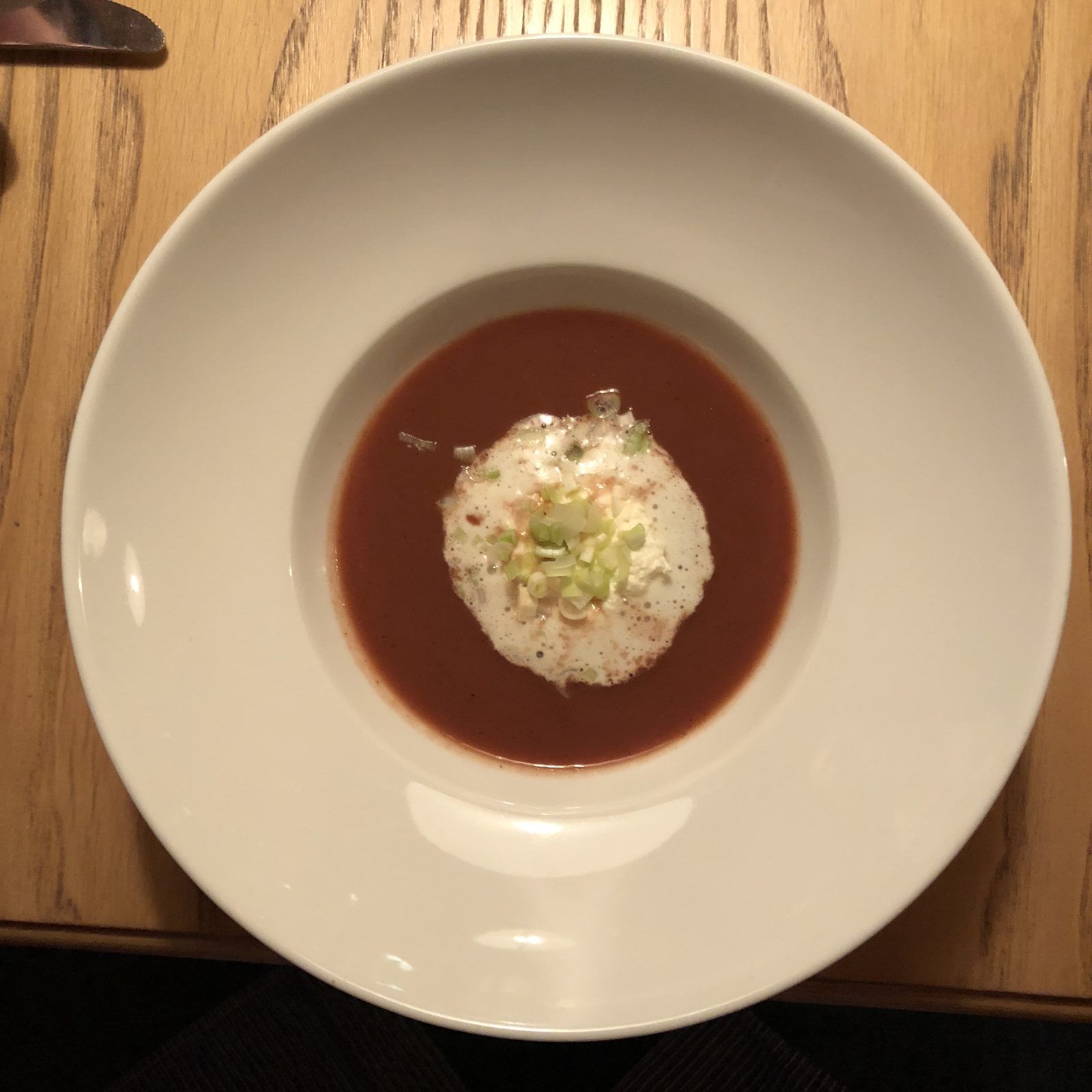 Red consommé with garnish – Bludenz